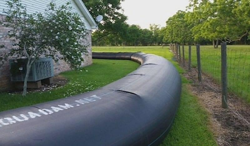 HT15. For $8300, a man purchased 400 feet of plastic to wrap his house
