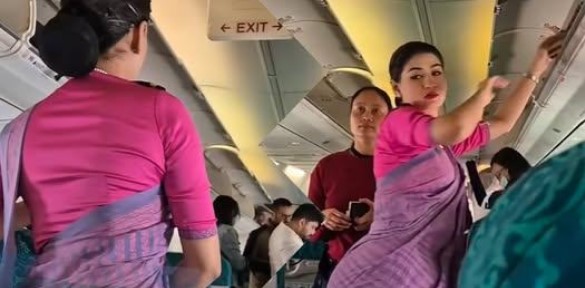HT1. Viral Flight Attendant Video Sparks Online Buzz Over Unconventional Uniform