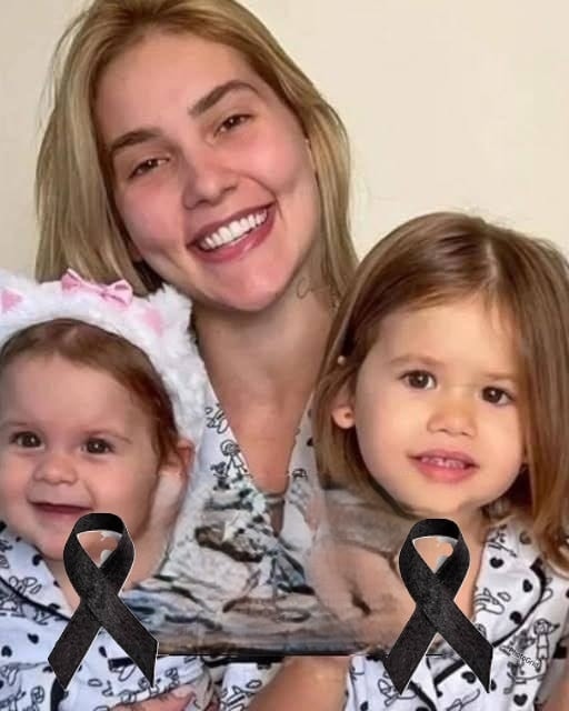 HT14. Young woman puts both daughters inside the fir…