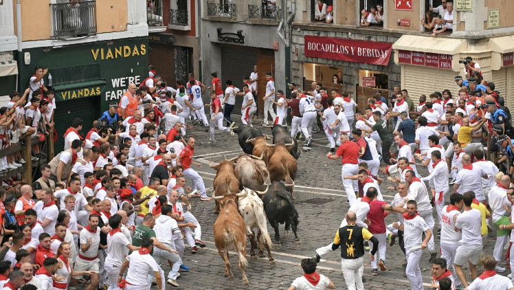 HT3. Spain The San Fermín bull run festival has seen 13 people injured, including one who was gored in the face by a bull.