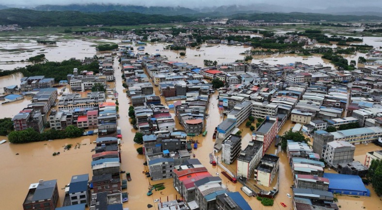 HT3. Heavy rains cause dam breach, China issues flood warning