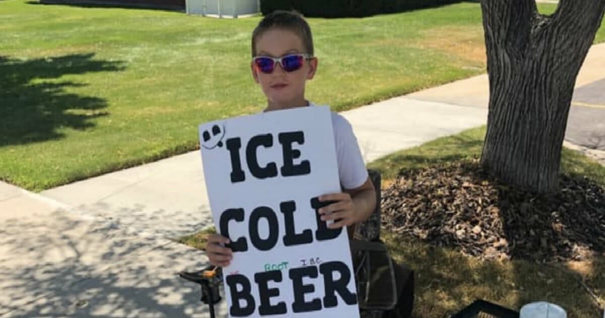 HT3. Police are called on boy selling “ice cold beer”—but then they get a closer look at his sign