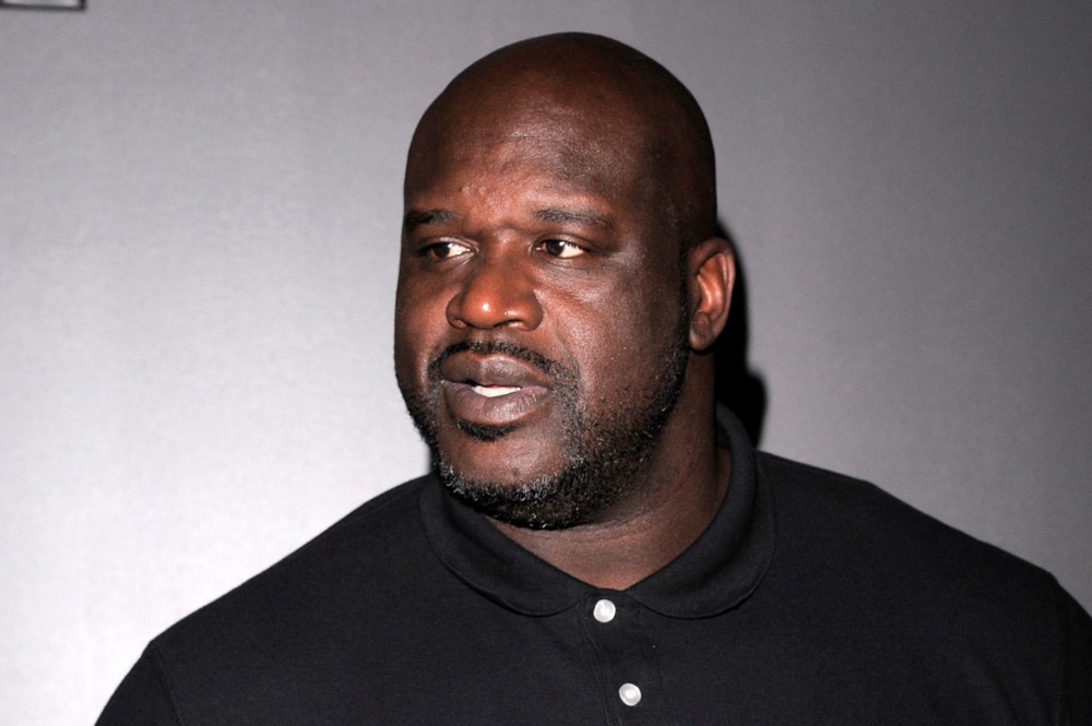 HT2. Shaq surprises family of 11 with two new cars and more
