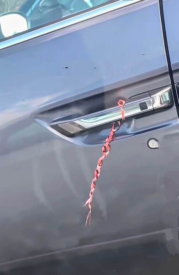 HT2. Seeing a Wire Tied Around a Car Door Handle: What It Could Mean