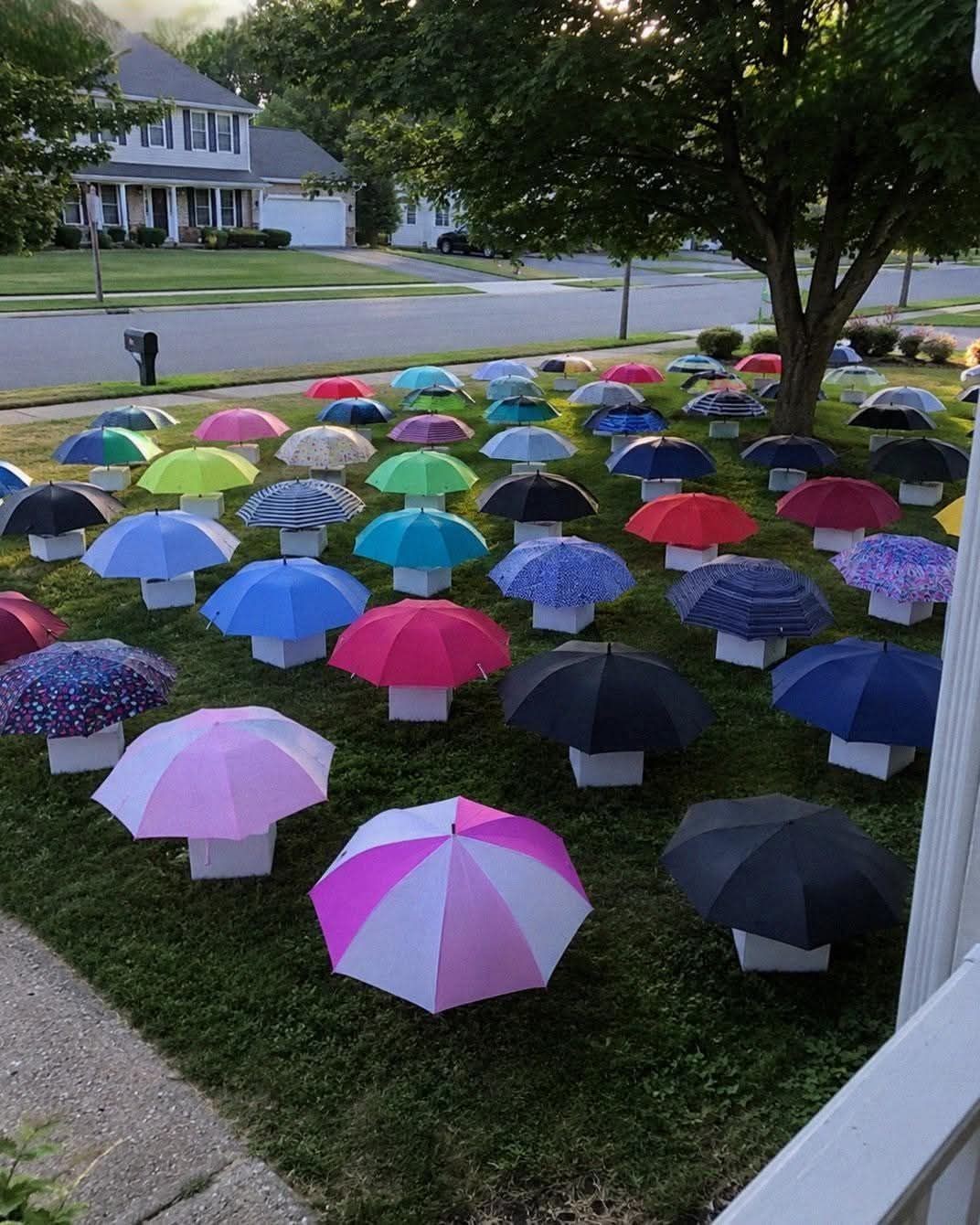 HT4. My Son Gave His Umbrella to a Pregnant Stranger in the Rain – The Next Morning, 47 Umbrellas Appeared on Our Lawn, Each With a Numbered Box That Made My Heart Stop